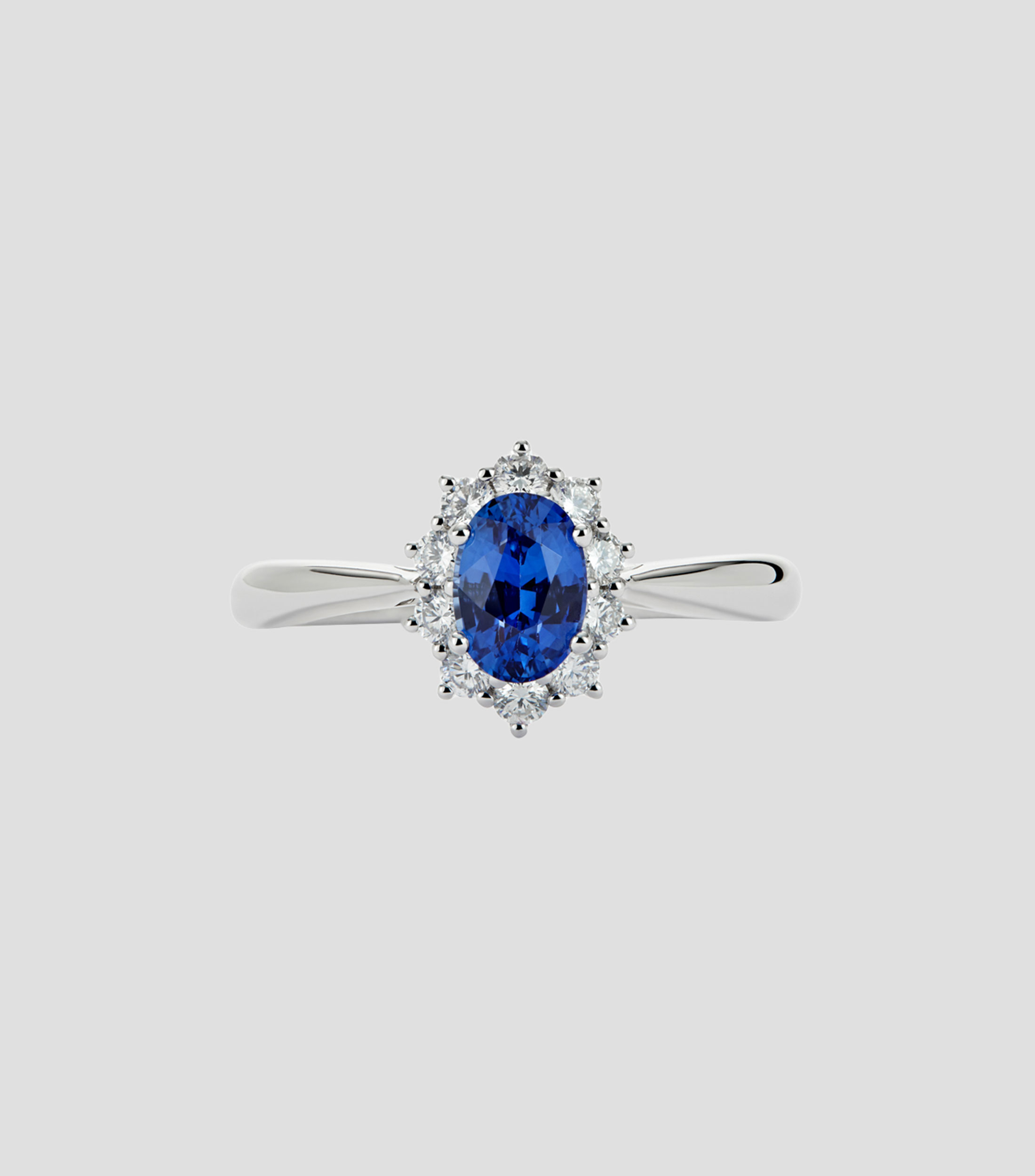 Anillo en Oro blanco de 18 Kilates con zafiro azul Mujer